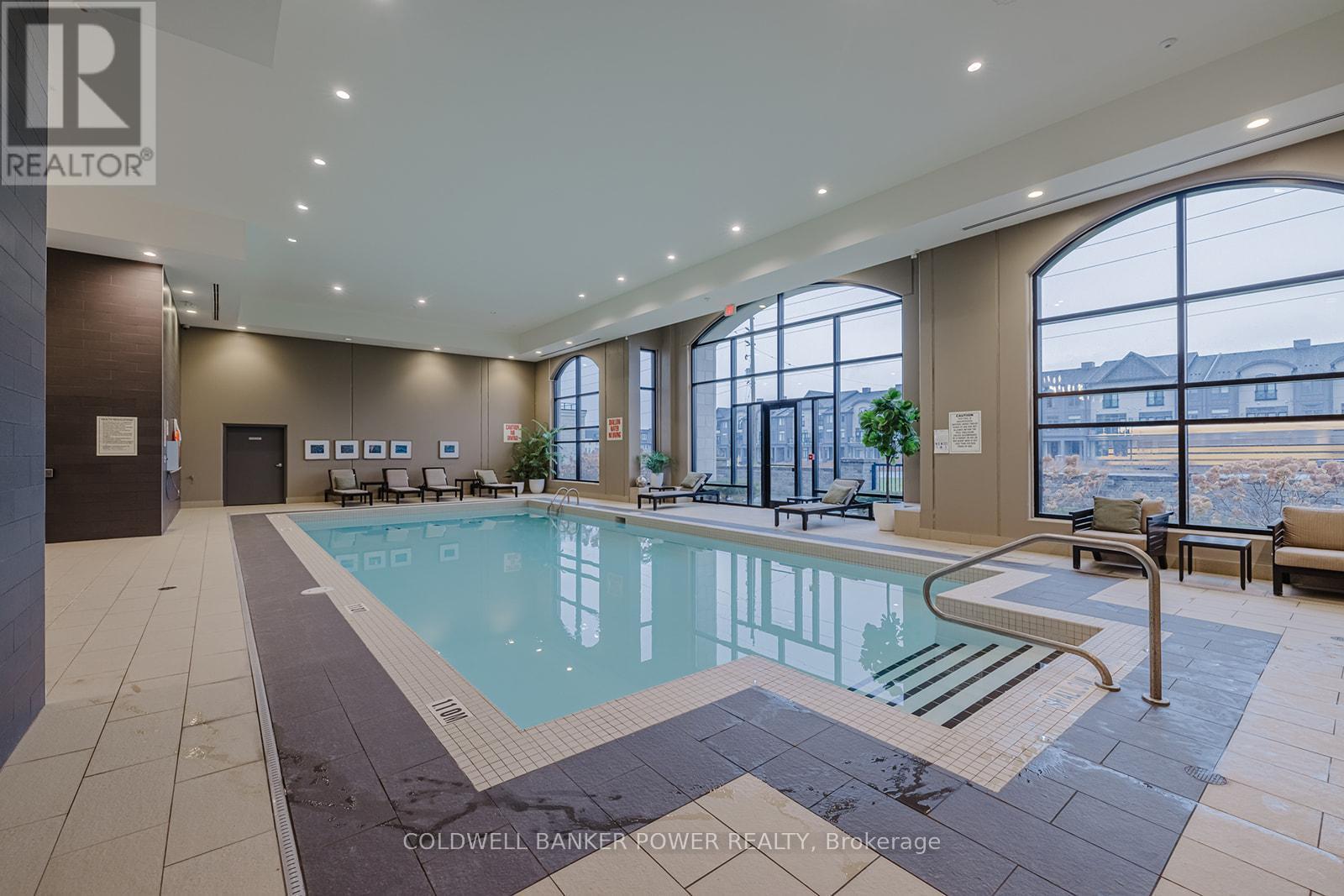1103 - 260 Villagewalk Boulevard, London North (North R), ON - Indoor Photo Showing Other Room With In Ground Pool