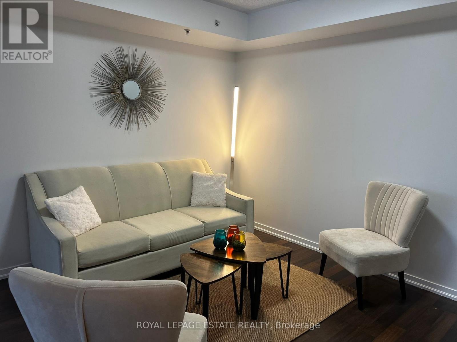 612 - 20 Joe Shuster Way, Toronto, ON - Indoor Photo Showing Living Room