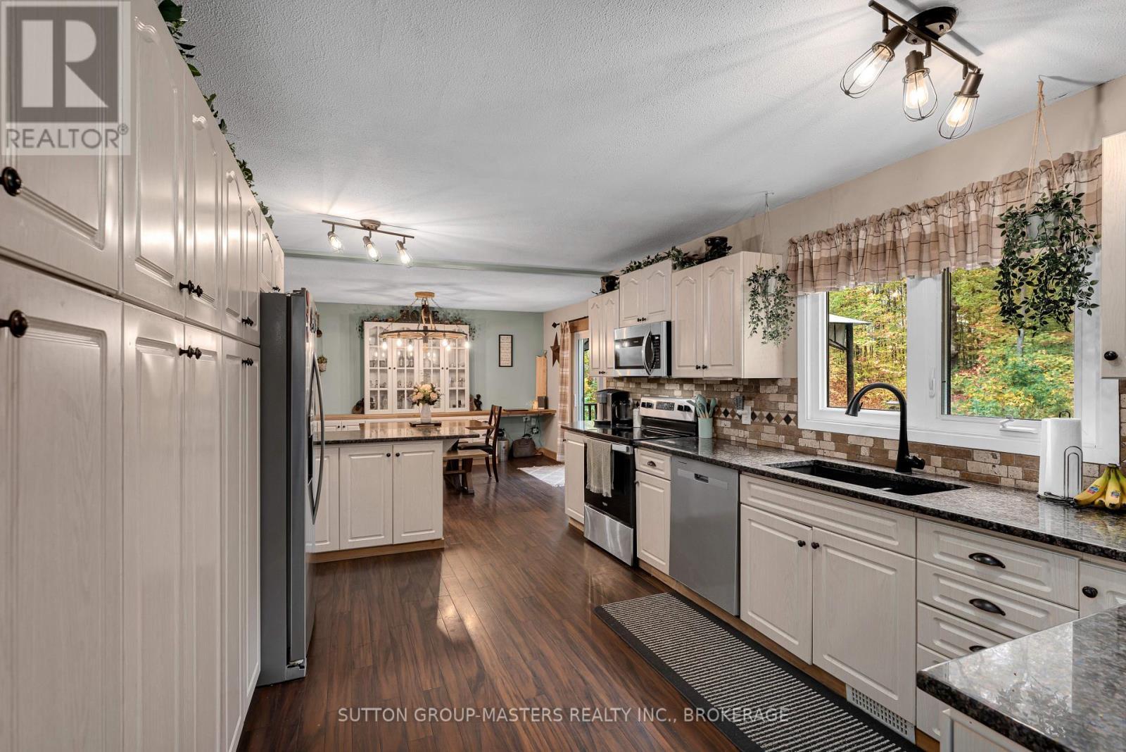 2382 Sands Road, Frontenac (Frontenac South), ON - Indoor Photo Showing Kitchen With Double Sink