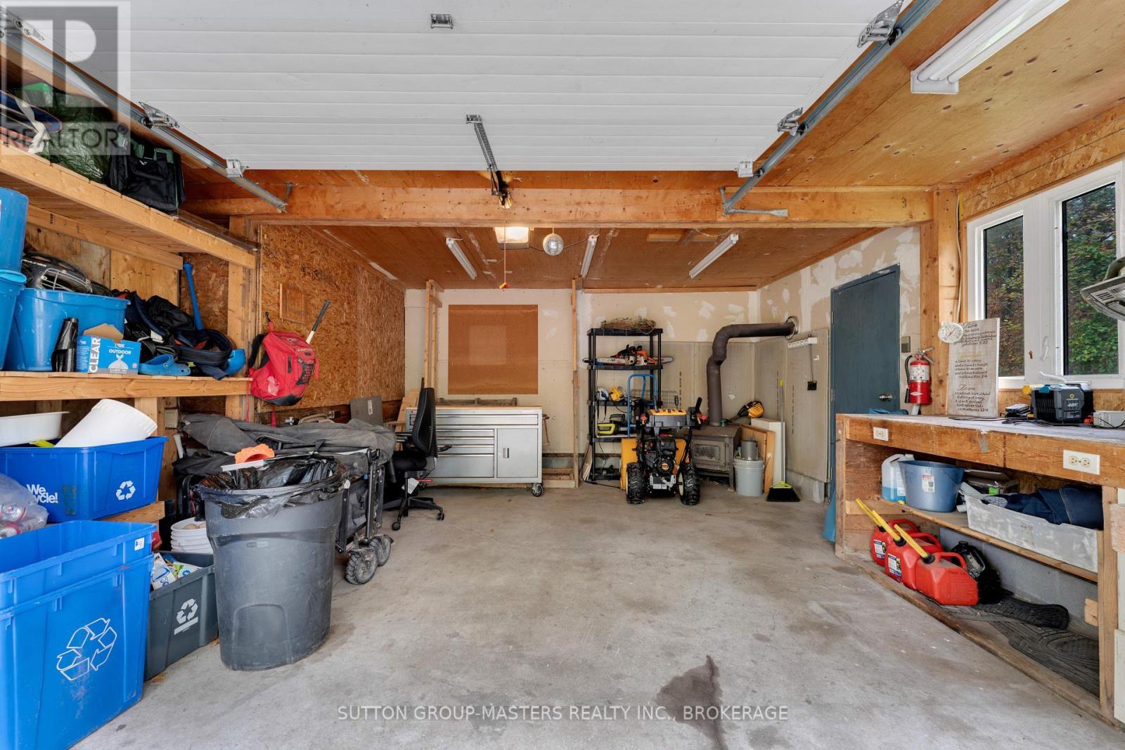 2382 Sands Road, Frontenac (Frontenac South), ON - Indoor Photo Showing Garage