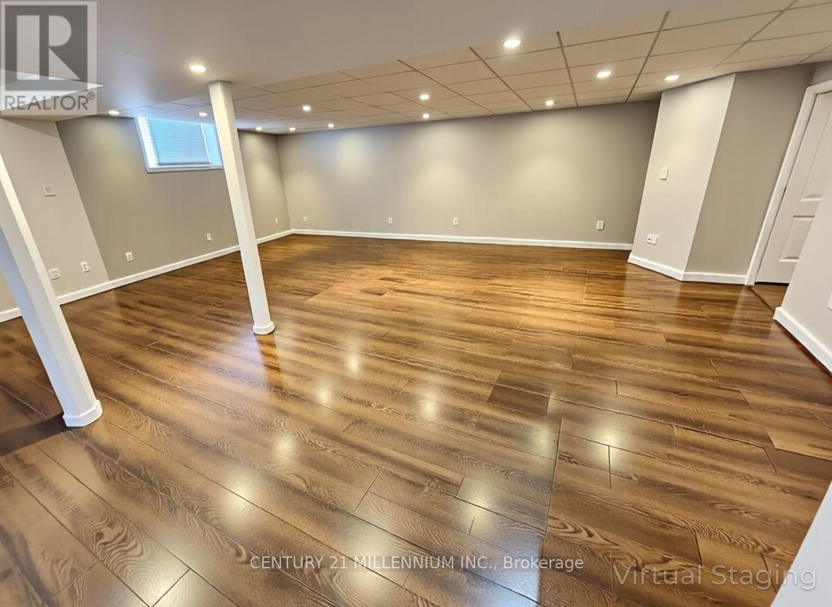 Recreational Room Virtually Staged Empty - 524 Davis Drive, Shelburne, ON - Indoor