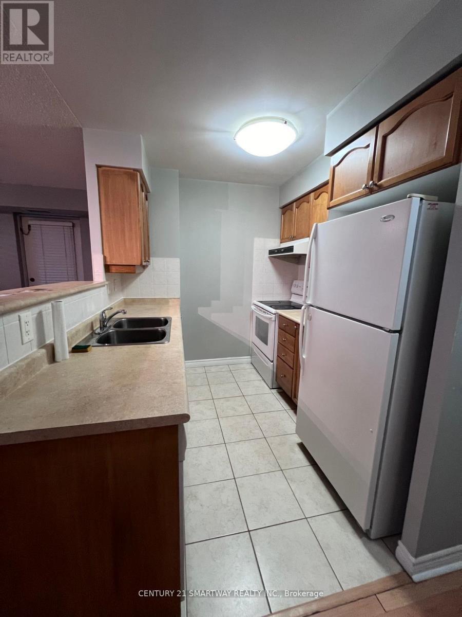 425 - 700 Humberwood Boulevard, Toronto, ON - Indoor Photo Showing Kitchen With Double Sink