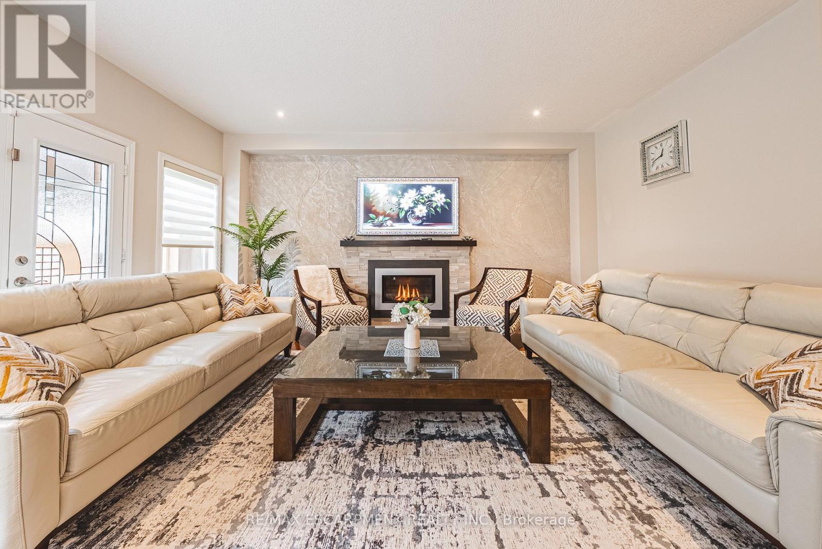 96 Hidden Ridge Crescent, Hamilton, ON - Indoor Photo Showing Living Room With Fireplace