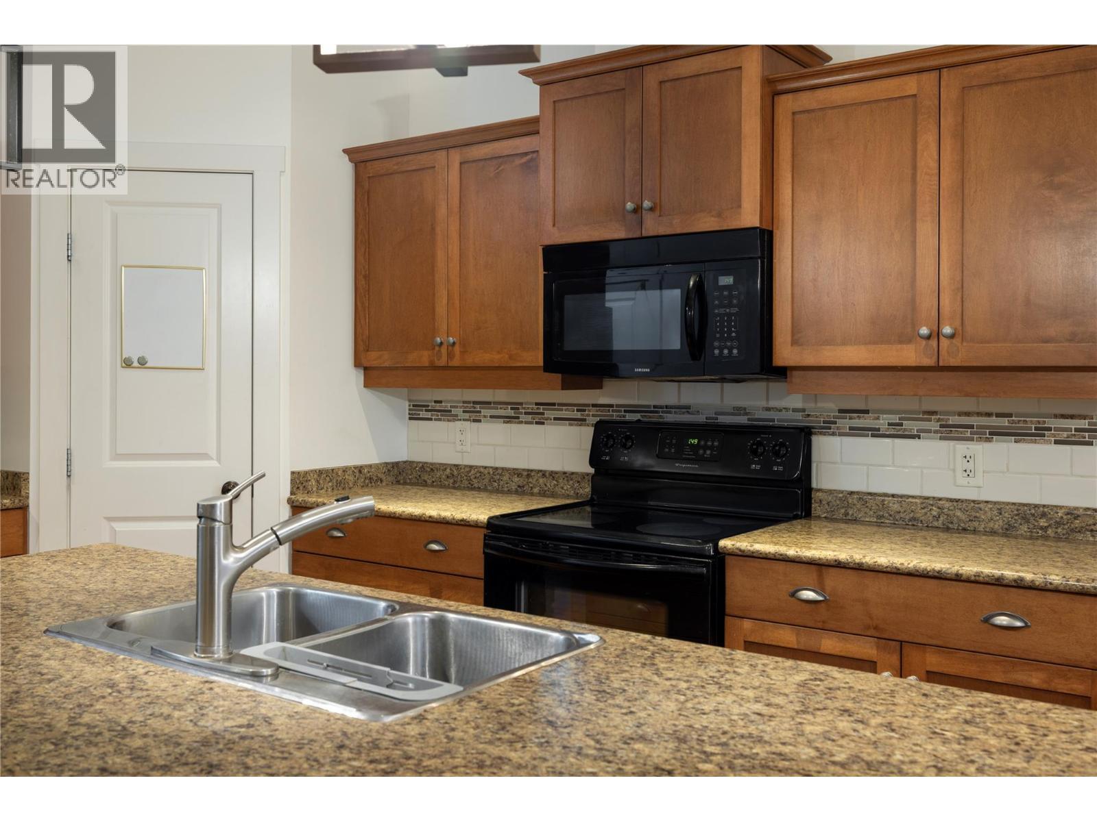 Cabinetry for placement. - 10634 Powley Court Unit# 208, Lake Country, BC - Indoor Photo Showing Kitchen With Double Sink