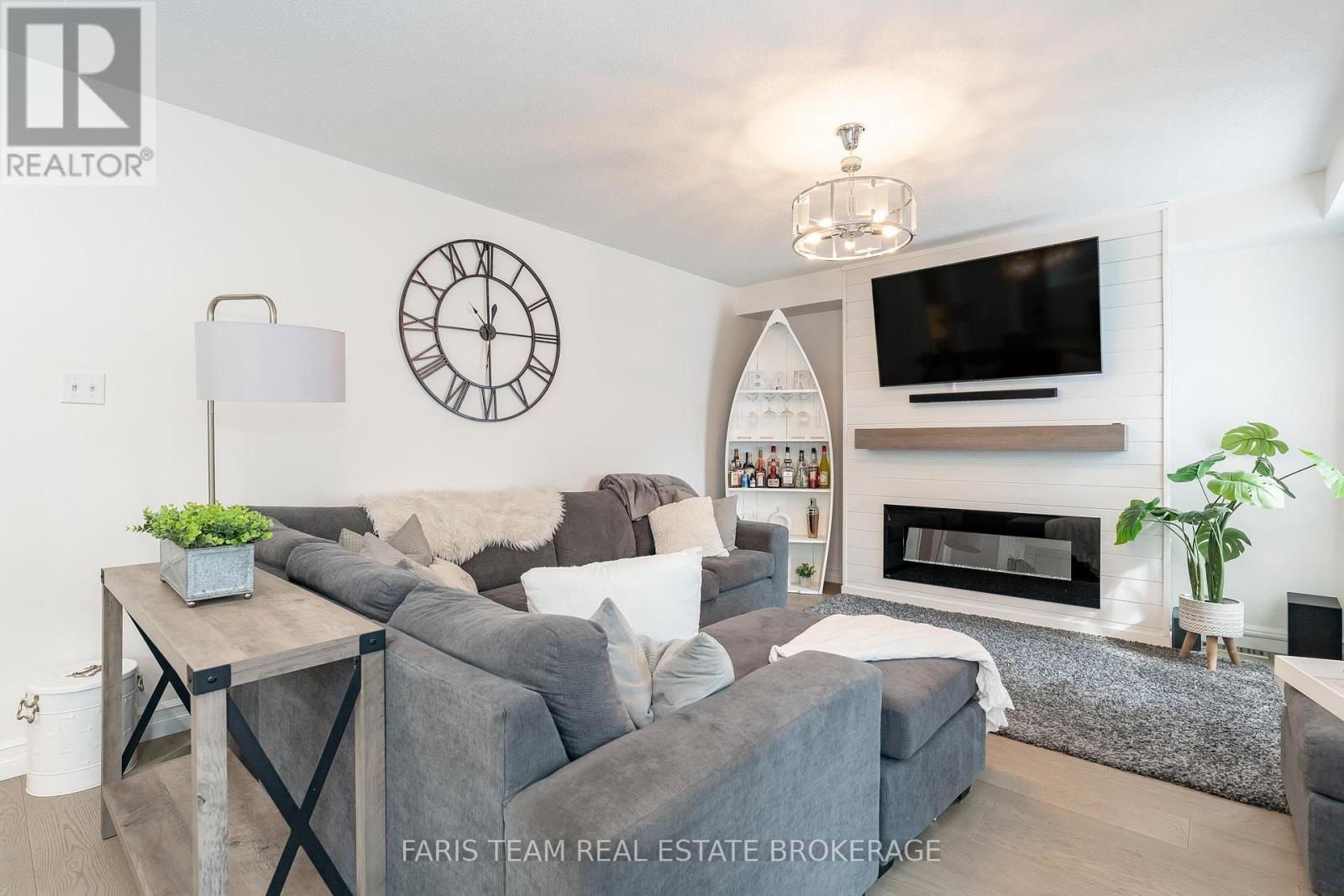 3 Saxon Road, Barrie, ON - Indoor Photo Showing Living Room With Fireplace