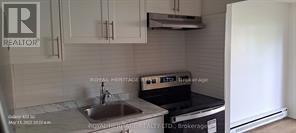 1 - 945 Simcoe Street N, Oshawa, ON - Indoor Photo Showing Kitchen