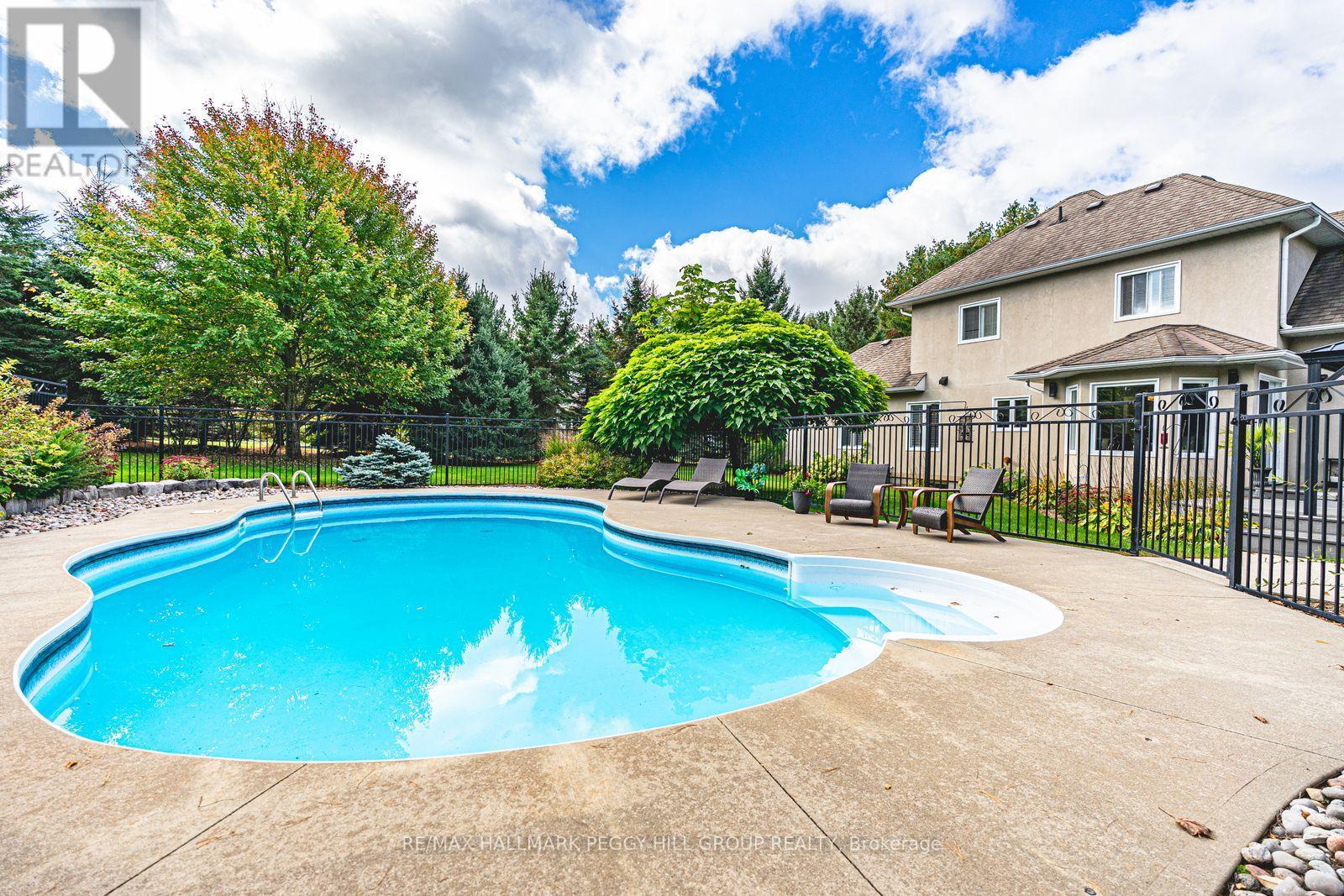 127 Goldfinch Crescent, Tiny, ON - Outdoor With In Ground Pool With Deck Patio Veranda With Backyard