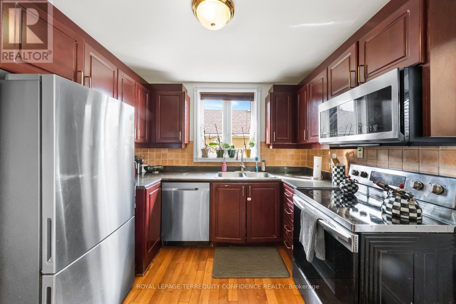 69 Nipigon Avenue, Toronto, ON - Indoor Photo Showing Kitchen With Stainless Steel Kitchen With Double Sink