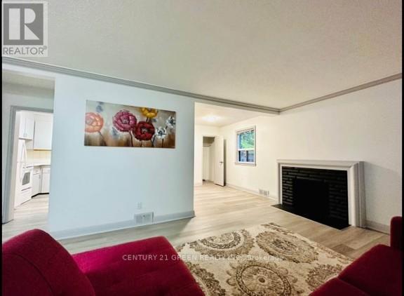 26 Kenton Drive, Toronto, ON - Indoor Photo Showing Living Room With Fireplace