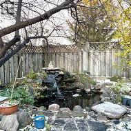 Zen-Inspired fountain with pond -