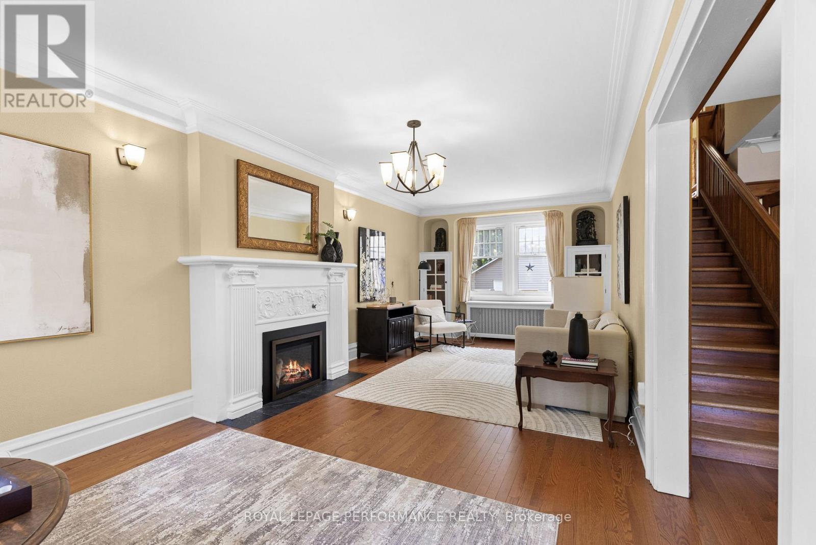 345 Third Avenue, Ottawa, ON - Indoor Photo Showing Living Room With Fireplace