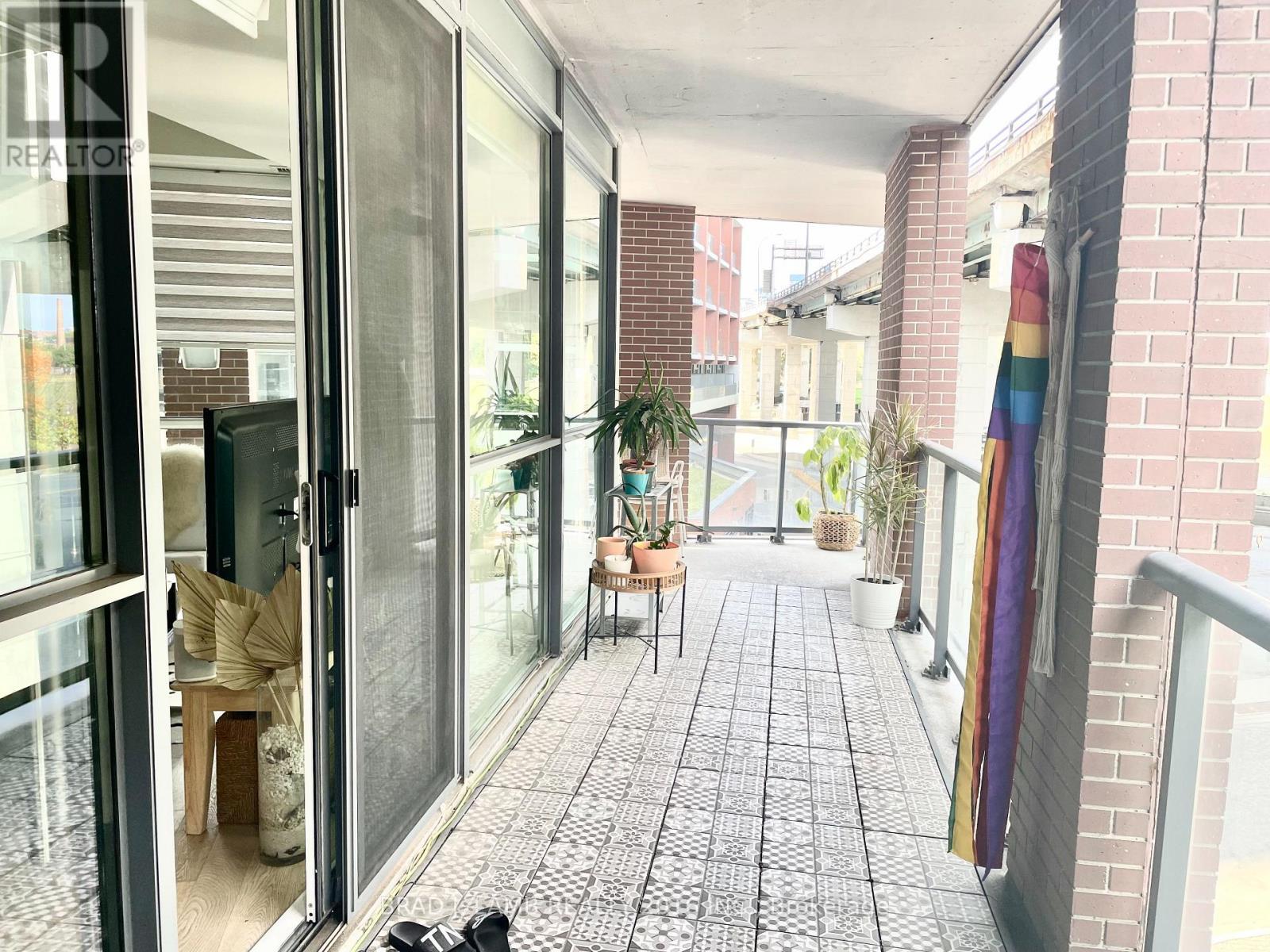 327 - 20 Bruyeres Mews, Toronto, ON - With Exterior