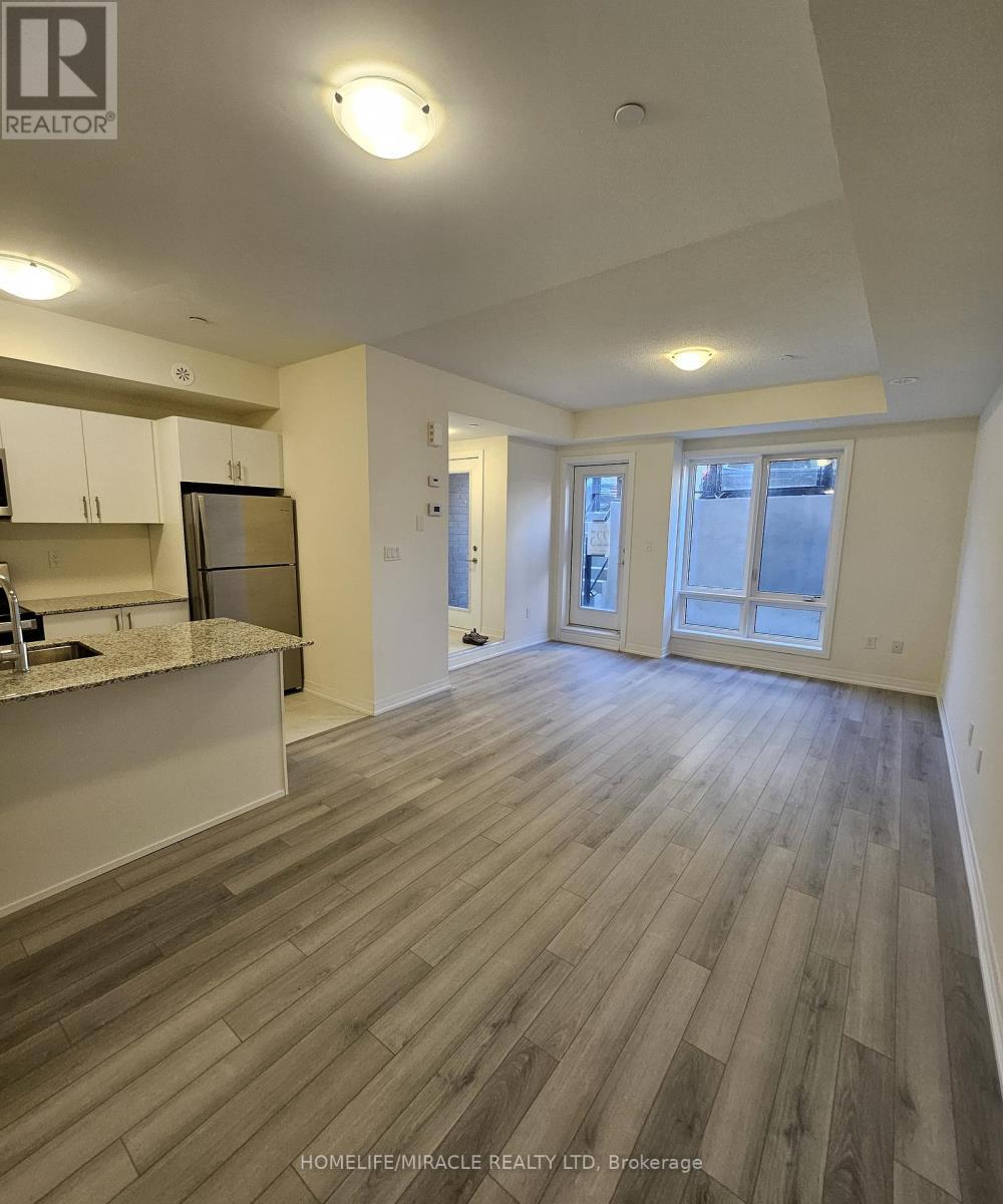 17 - 165 Tapscott Road, Toronto, ON - Indoor Photo Showing Kitchen With Double Sink