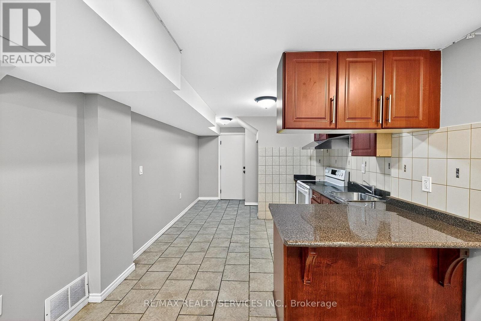 24 Addiscott Street, Brampton, ON - Indoor Photo Showing Kitchen With Double Sink