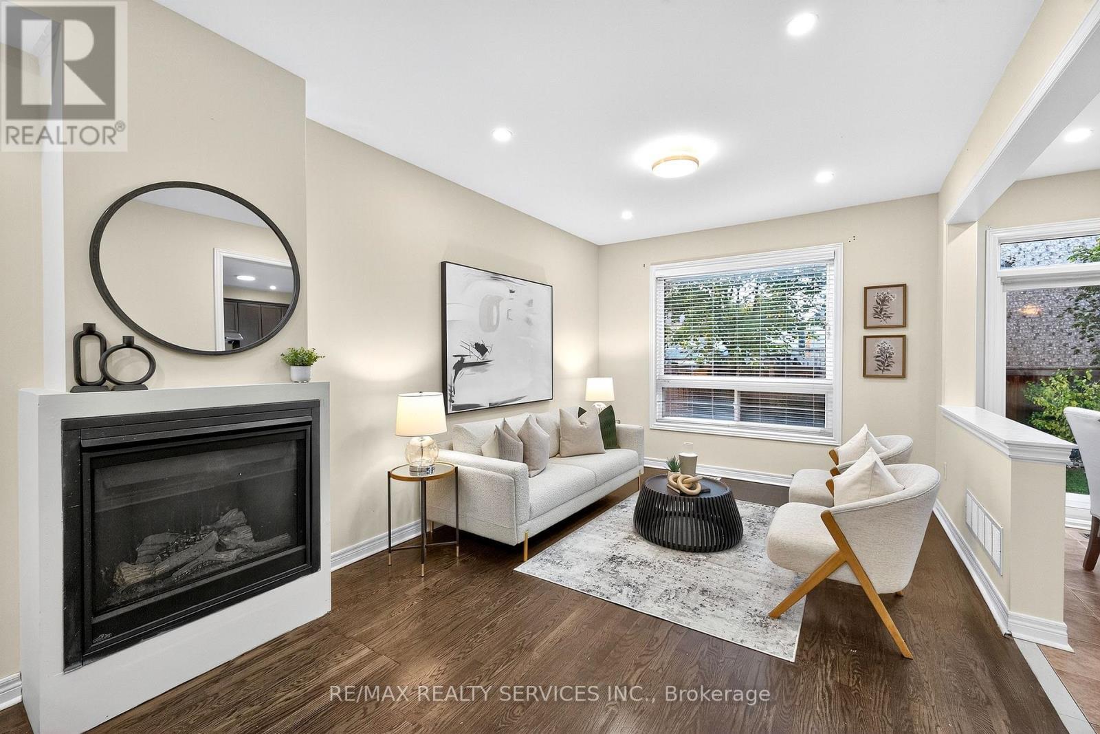 24 Addiscott Street, Brampton, ON - Indoor Photo Showing Living Room With Fireplace