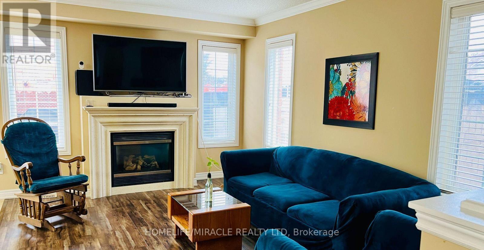 29 Brucewood Road, Brampton, ON - Indoor Photo Showing Living Room With Fireplace