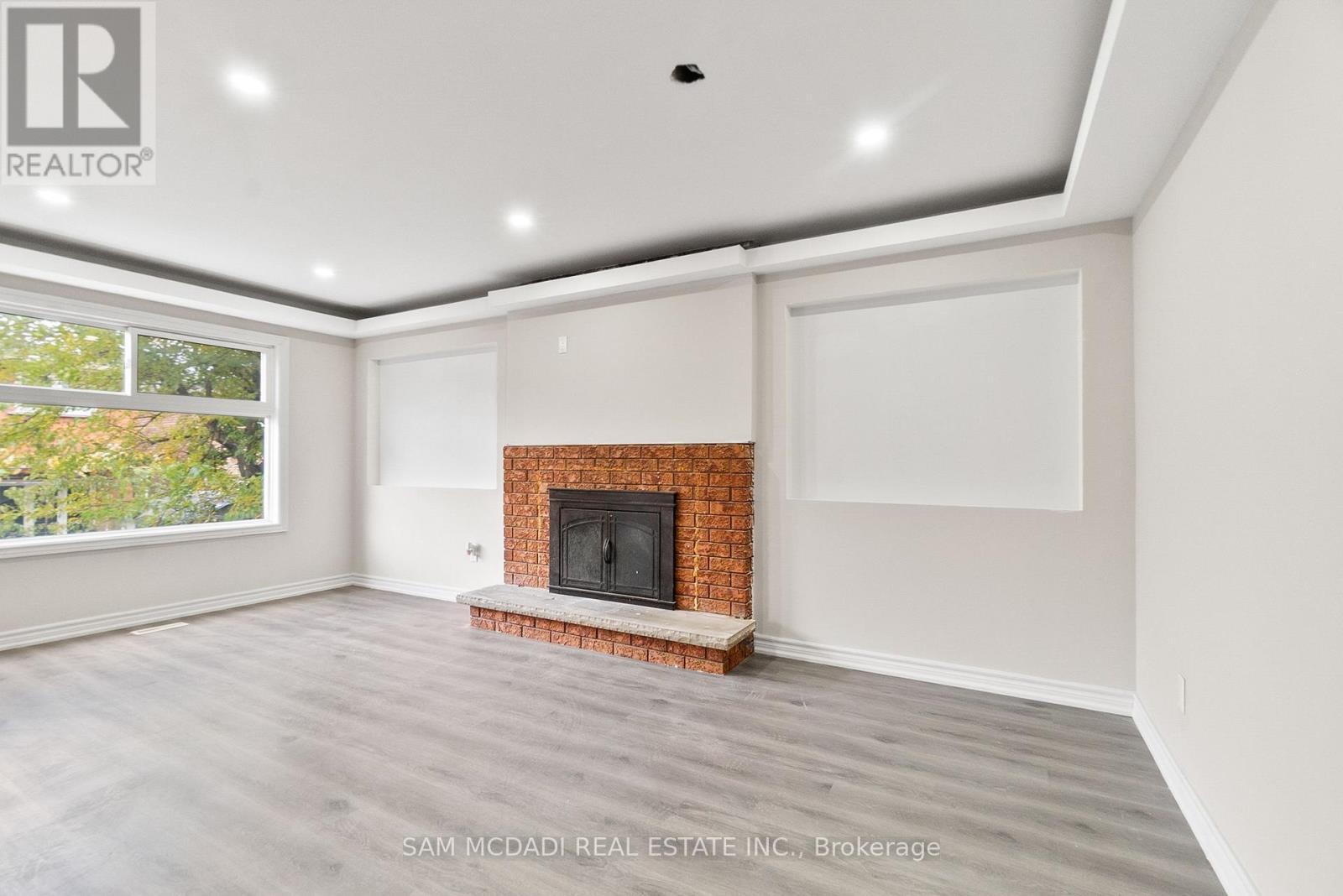 149 Sunforest Drive, Brampton, ON - Indoor Photo Showing Living Room With Fireplace