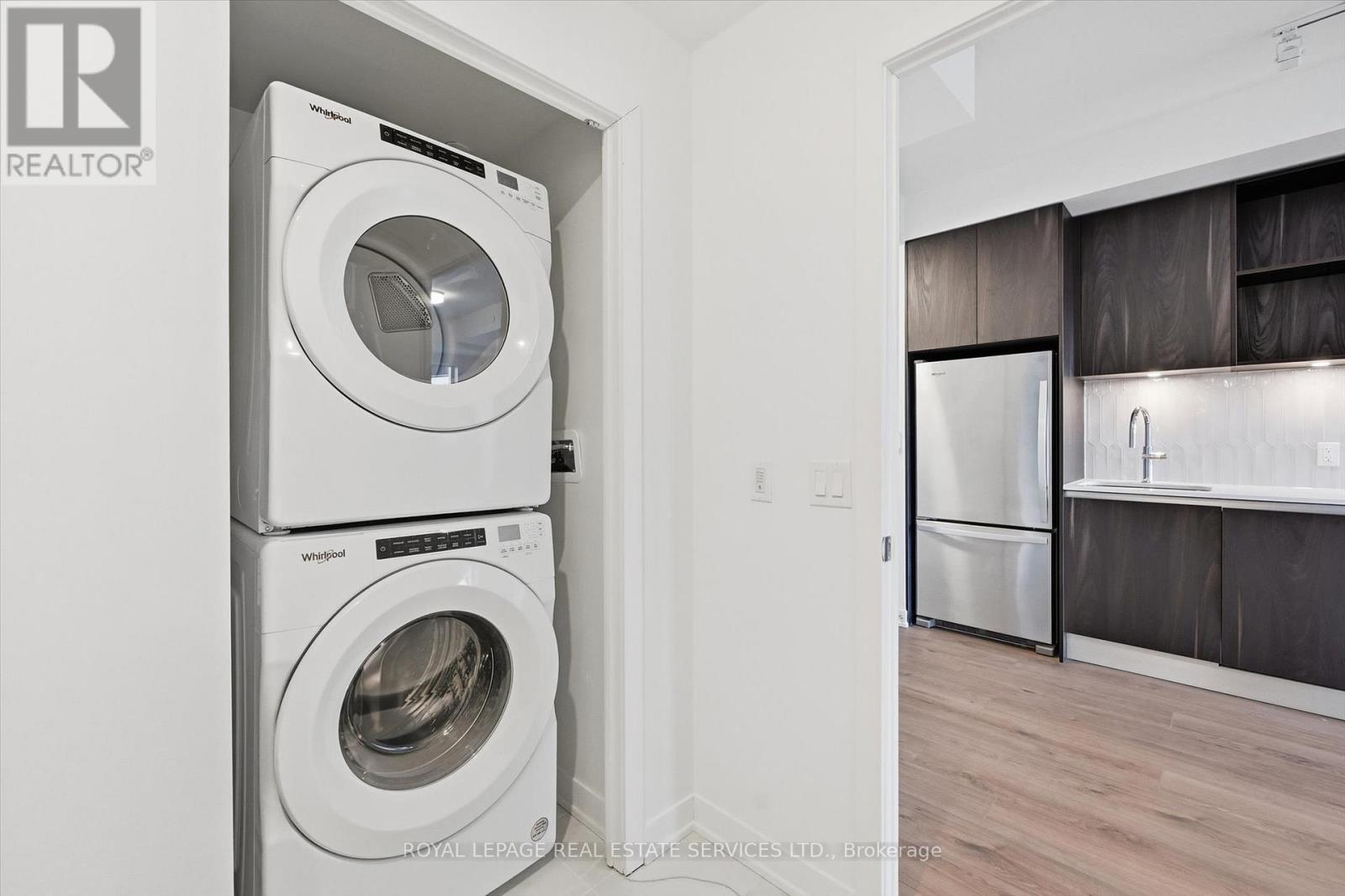 In-Suite Laundry with a Full-Sized Washer & Dryer - 603 - 395 Dundas Street W, Oakville, ON - Indoor Photo Showing Laundry Room