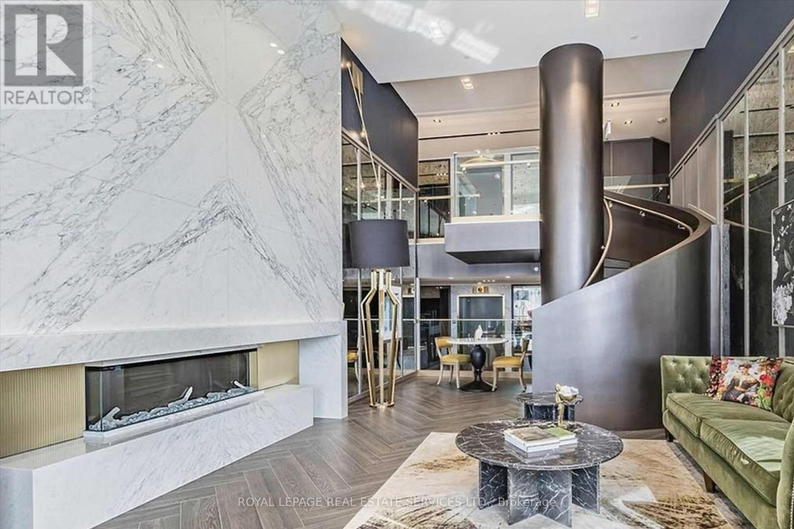 Sophisticated Lounge with Fireplace - 603 - 395 Dundas Street W, Oakville, ON - Indoor With Fireplace