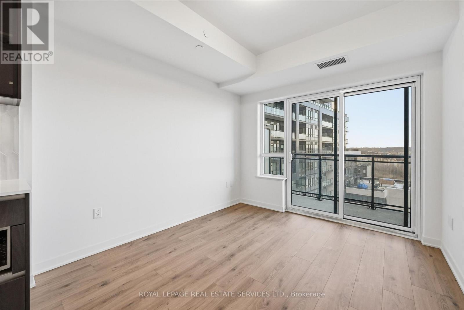 Inviting Living Room w/Walkout to Private Balcony - 603 - 395 Dundas Street W, Oakville, ON - Indoor Photo Showing Other Room
