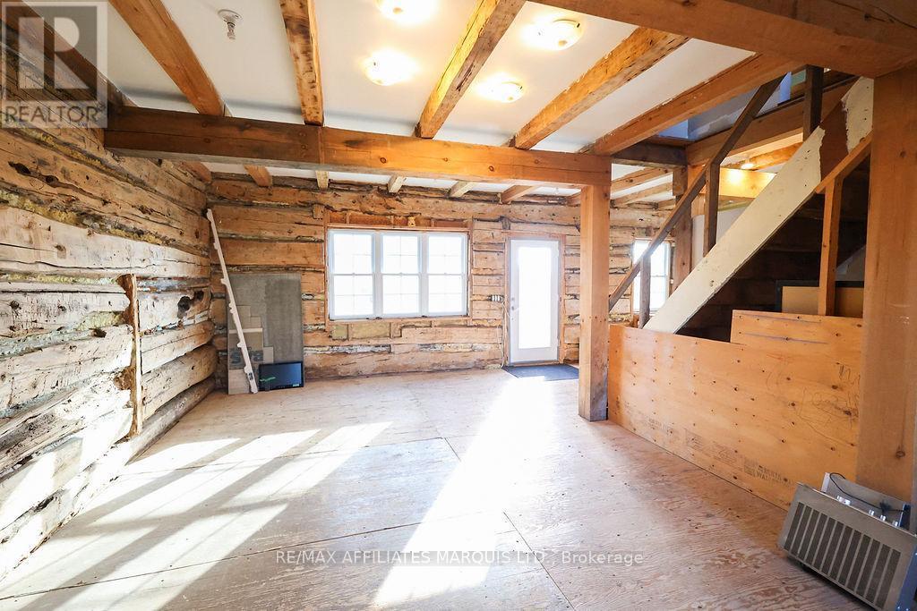 Living room/Dining room in original home. - 21259 Conc 8 Road, South Glengarry, ON