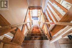 Stairs to second level. -