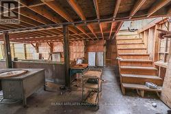 Showing stairs to loft in coverall -