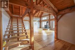 Area 1 looking to grandroom showing stairs to loft -