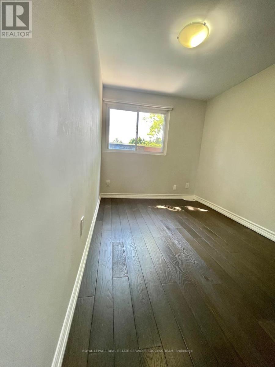 17 Curly Vineway N, Toronto, ON - Indoor Photo Showing Other Room