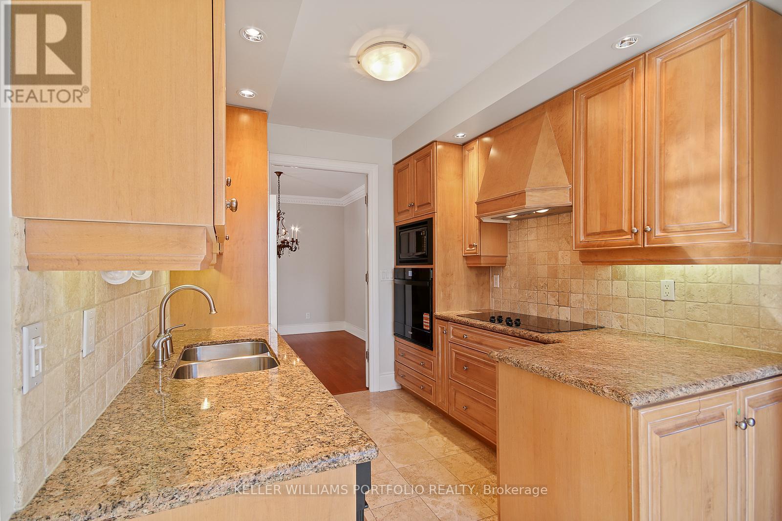 1003 - 10 Bellair Street, Toronto, ON - Indoor Photo Showing Kitchen With Double Sink