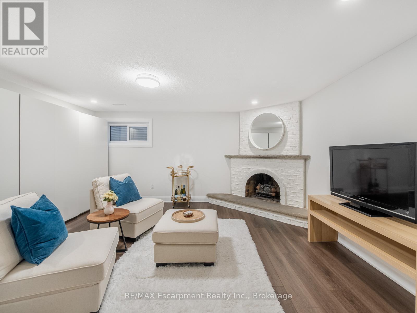 143 Chalfield Lane, Mississauga (Rathwood), ON - Indoor Photo Showing Living Room With Fireplace