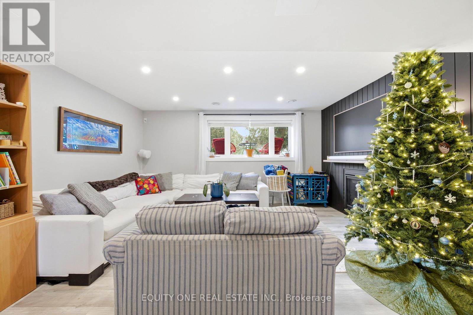 5453 Long Island Road, Ottawa, ON - Indoor Photo Showing Living Room With Fireplace