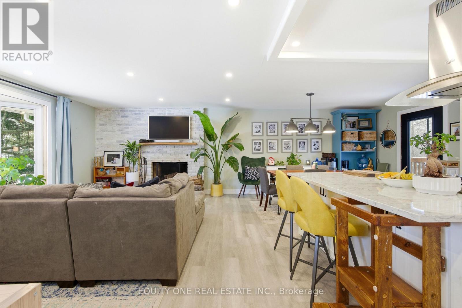 5453 Long Island Road, Ottawa, ON - Indoor Photo Showing Living Room With Fireplace