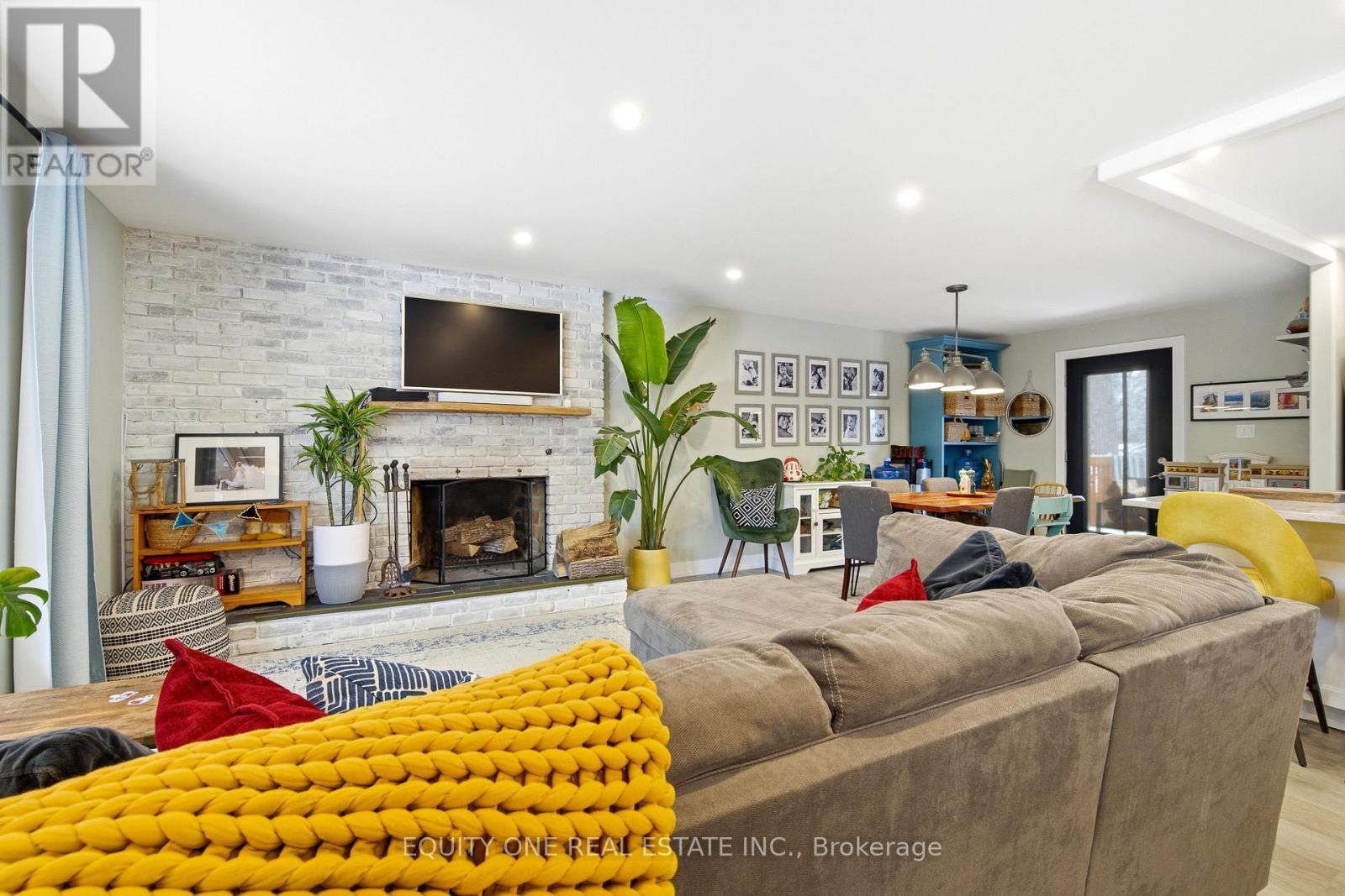 5453 Long Island Road, Ottawa, ON - Indoor Photo Showing Living Room With Fireplace