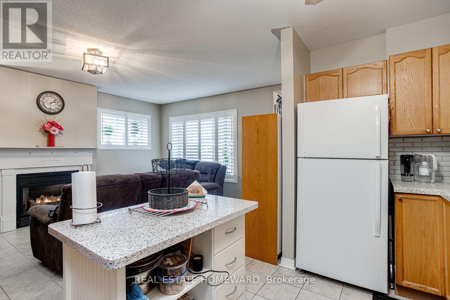 102 - 106 Anne Street, Cobourg, ON - Indoor Photo Showing Kitchen With Fireplace