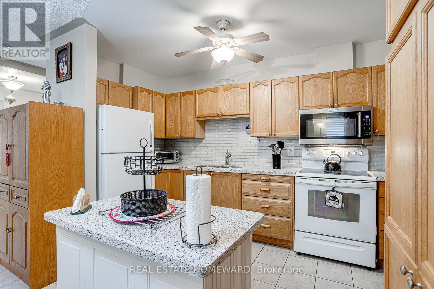 102 - 106 Anne Street, Cobourg, ON - Indoor Photo Showing Kitchen With Double Sink