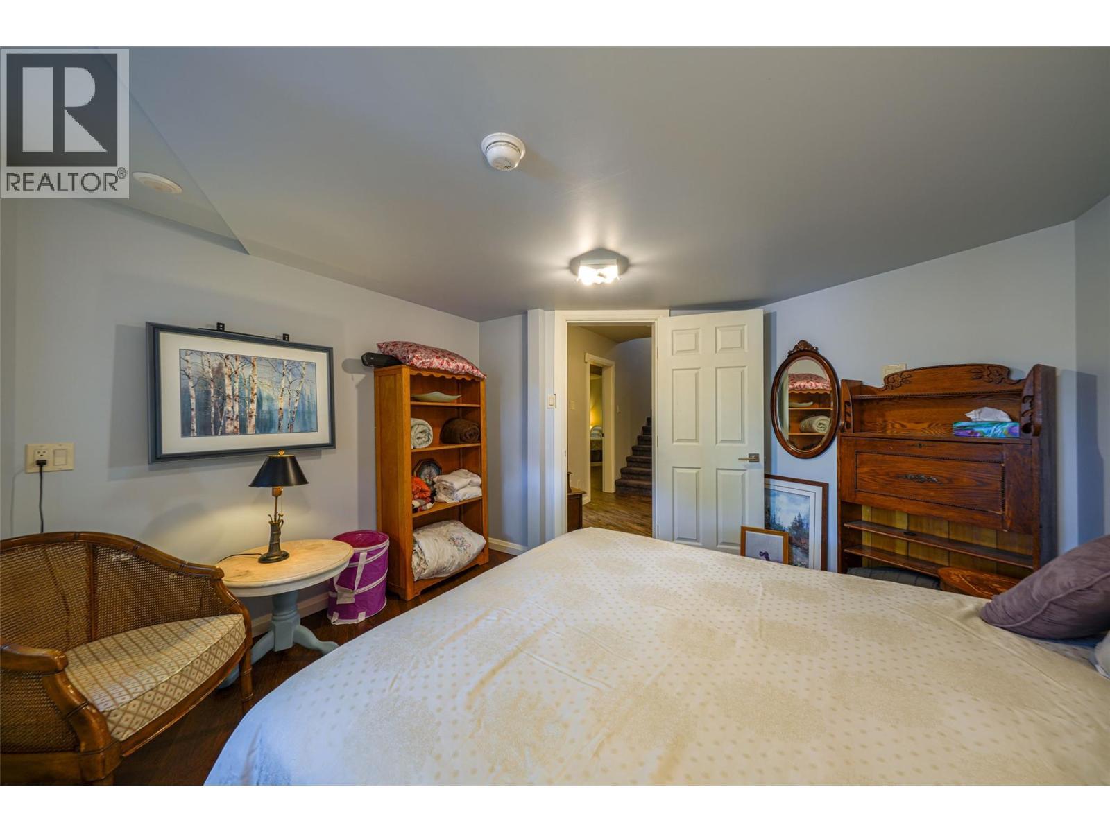 Basement Bedroom #1 - 14038 Ponderosa Way, Coldstream, BC - Indoor Photo Showing Bedroom