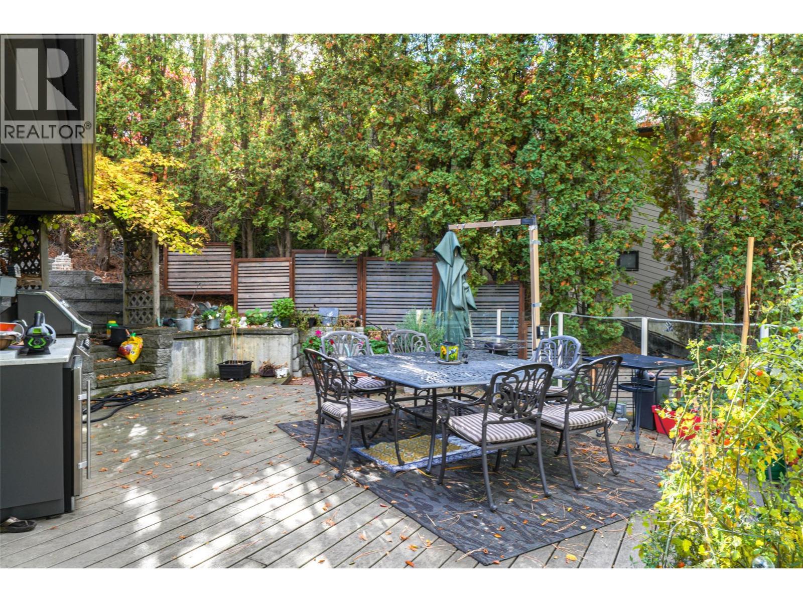Deck with outdoor Kitchen off the Main Level Kitchen - 14038 Ponderosa Way, Coldstream, BC - Outdoor With Deck Patio Veranda With Exterior