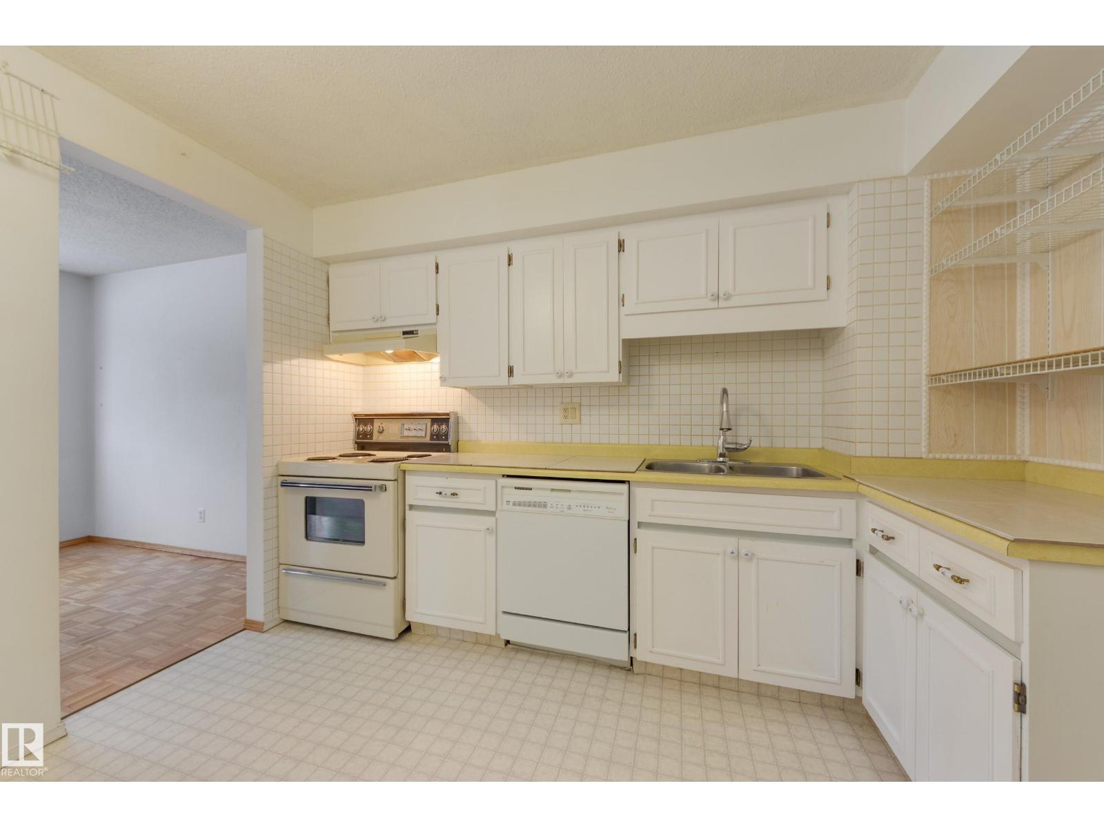 13449 40 St Nw, Edmonton, AB - Indoor Photo Showing Kitchen With Double Sink