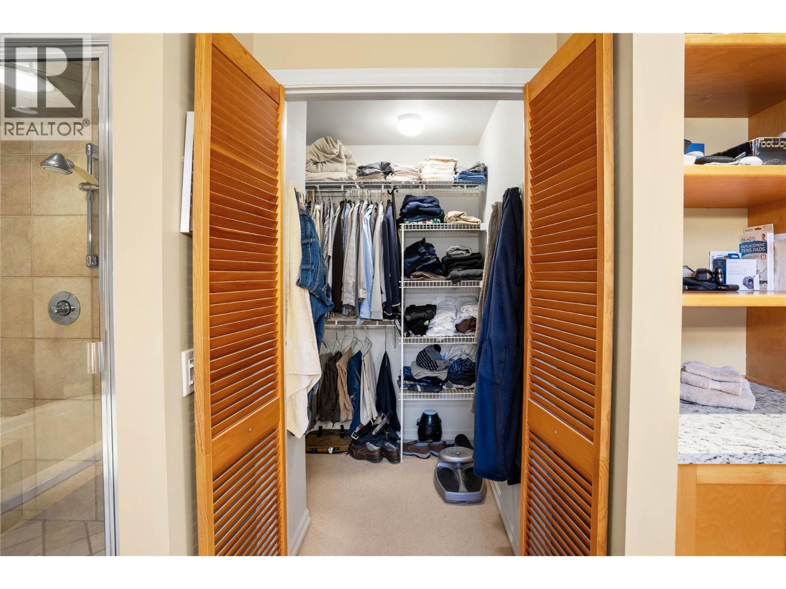 Primary Walk-in closet - 1988 Dewdney Road, Kelowna, BC - Indoor With Storage