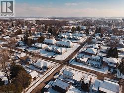 Aerial view of property's location featuring nearby suburban area -