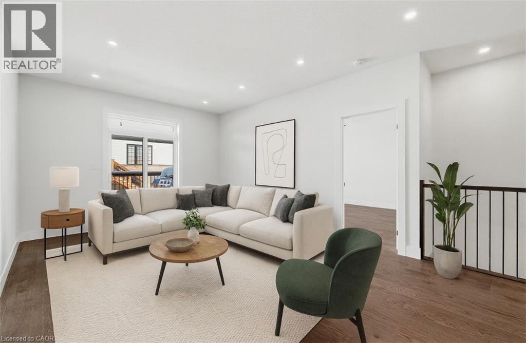 Living area with wood finished floors and recessed lighting - 4 Elgin Street W, Norwich, ON - Indoor Photo Showing Living Room