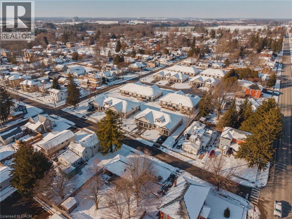 Snowy aerial view featuring a residential view - 4 Elgin Street W, Norwich, ON - Outdoor With View
