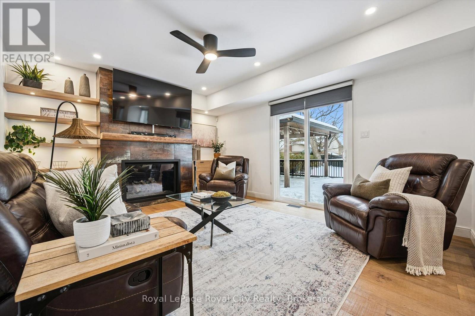 Family Room - 4 Gryphon Place, Guelph (Kortright West), ON - Indoor Photo Showing Living Room With Fireplace