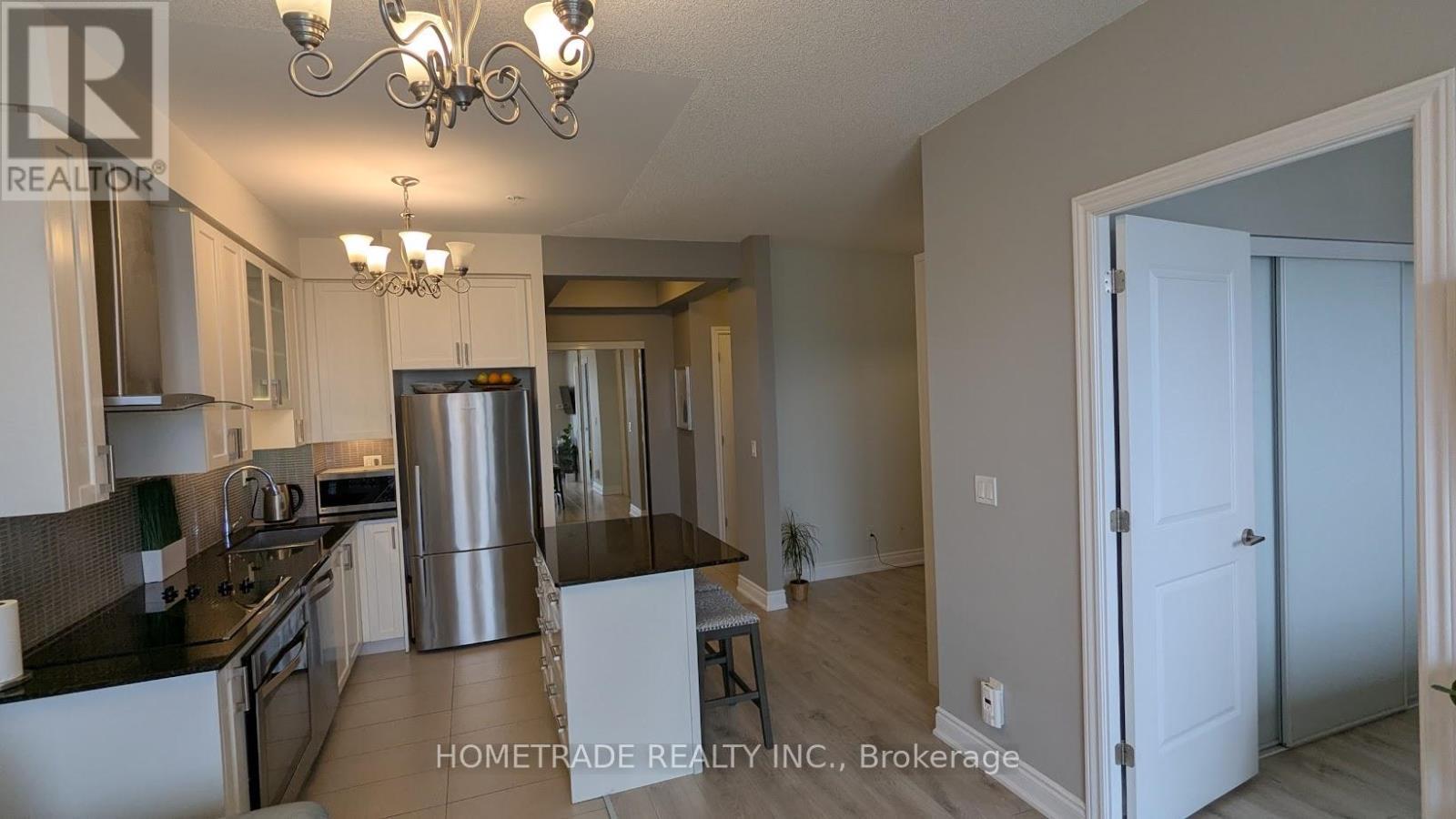 201B - 9090 Yonge Street, Richmond Hill, ON - Indoor Photo Showing Kitchen With Stainless Steel Kitchen