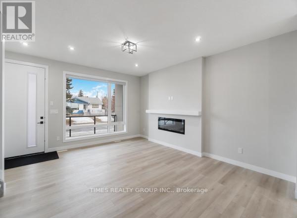 9145 154 St. Sw, Edmonton, AB - Indoor With Fireplace