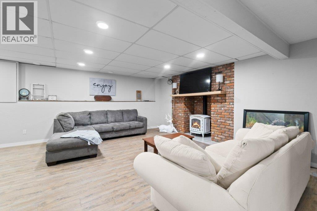 2131 21 Street Ne, Salmon Arm, BC - Indoor Photo Showing Basement With Fireplace