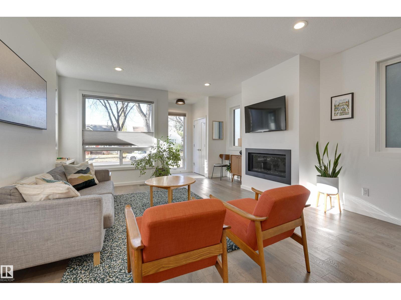 10411 144 St Nw, Edmonton, AB - Indoor Photo Showing Living Room With Fireplace