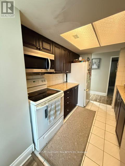 1707 - 5 Rowntree Road, Toronto, ON - Indoor Photo Showing Kitchen