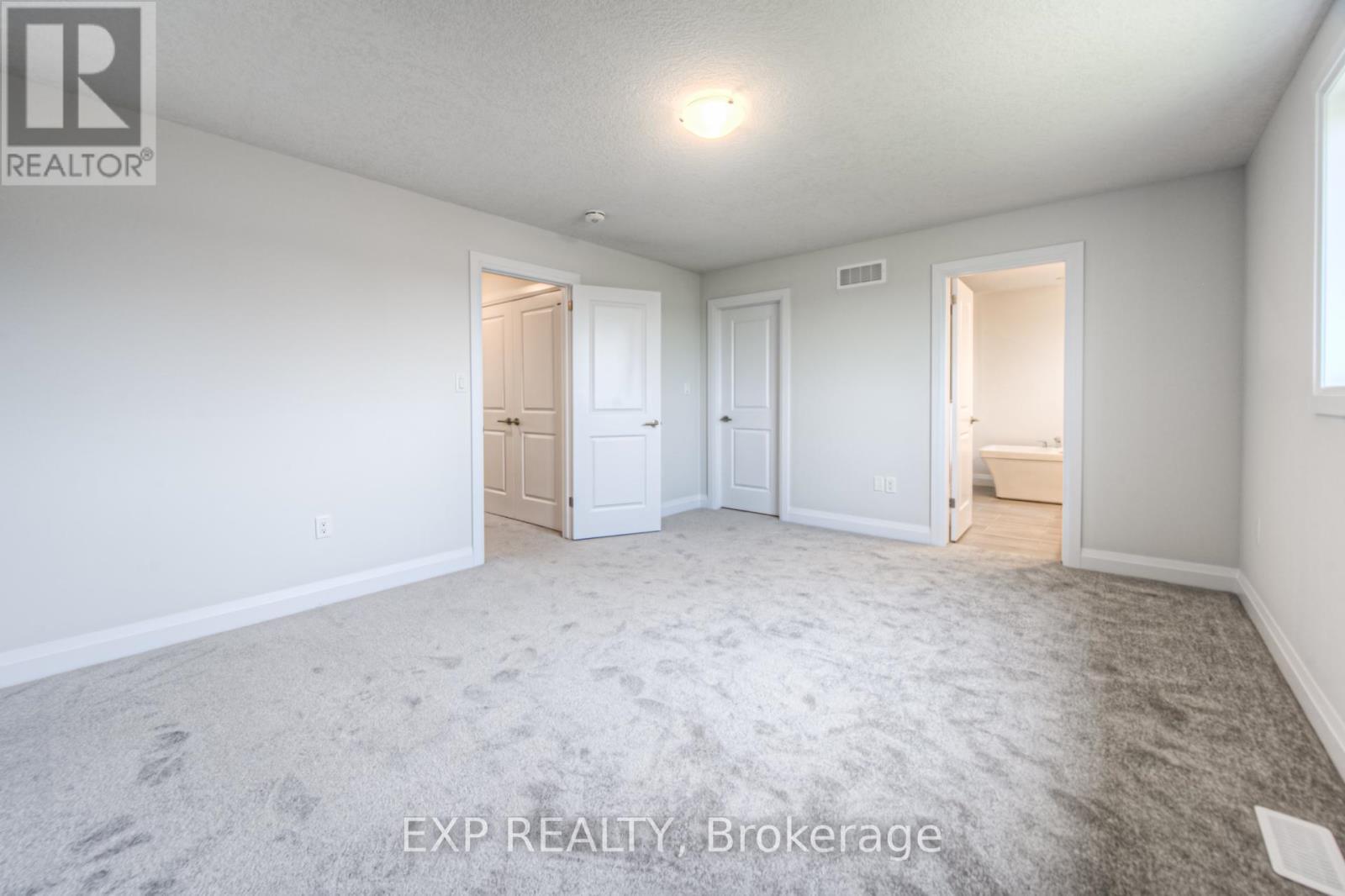 Example of other finished standard unit. - 235 Applewood Street, Blandford-Blenheim, ON - Indoor Photo Showing Other Room